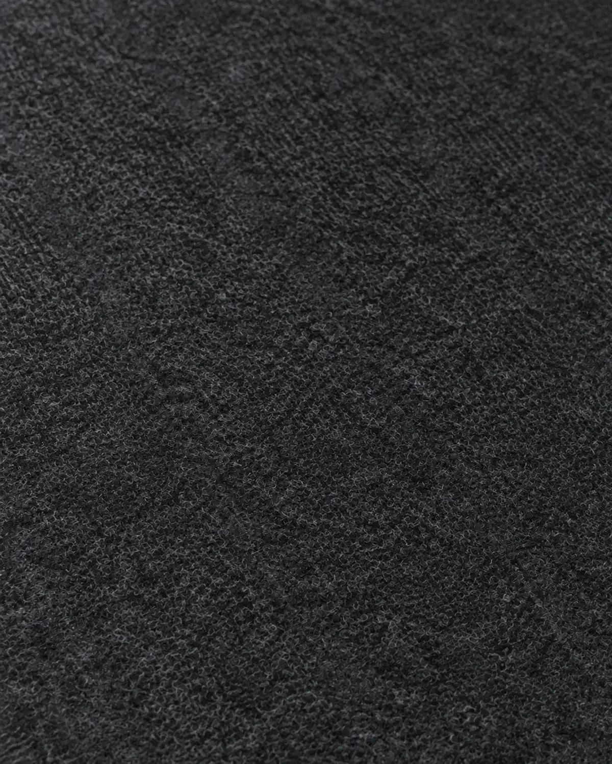 Cutaway illustration with veneer and MDF slats removed, revealing the continuous charcoal PET felt backing